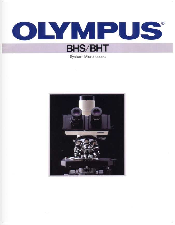 A close-up of a microscope
Description automatically generated