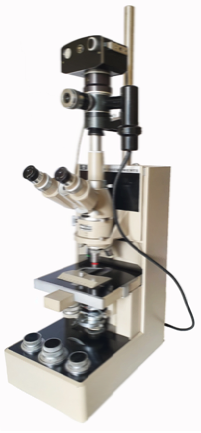 A close-up of a microscope
Description automatically generated