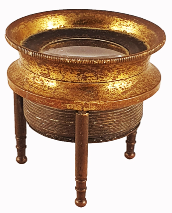 A gold and black metal bowl
Description automatically generated with medium confidence