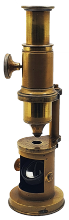 A close-up of a microscope
Description automatically generated